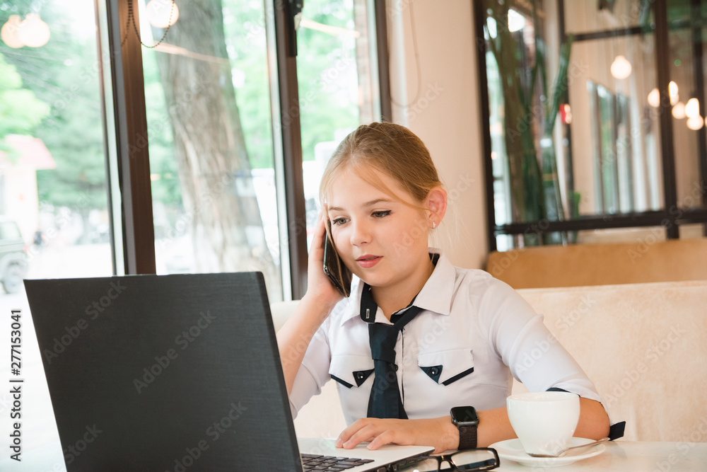 Charismatic girl as a businesswoman in cafe at lunch. Business youth. Charismatic girl as a businesswoman in cafe at lunch. Business youth.