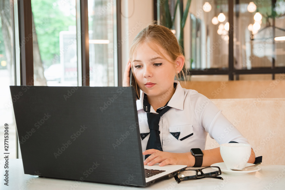 Charismatic girl as a businesswoman in cafe at lunch. Business youth. Charismatic girl as a businesswoman in cafe at lunch. Business youth.