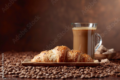  Coffee latte and croissant.
