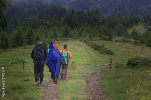hikers walking in the mountains. goal, success, freedom and achievement concept