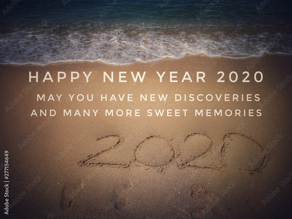 Fototapeta premium New Year Quote On Blurred Sandy Beach Background