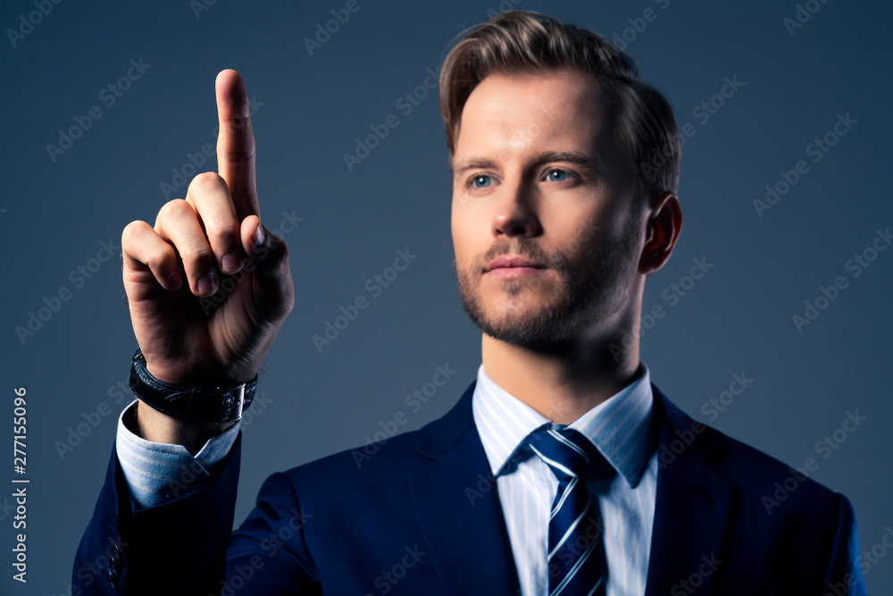 close up businessman hand point and show finger in copy space business creativity ideas concept black background close up businessman hand point and show finger in copy space business creativity ideas concept black background