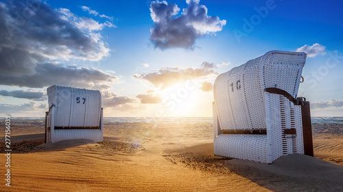Fototapeta Naklejka Na Ścianę i Meble -  sunset at the baltic sea with beach chairs