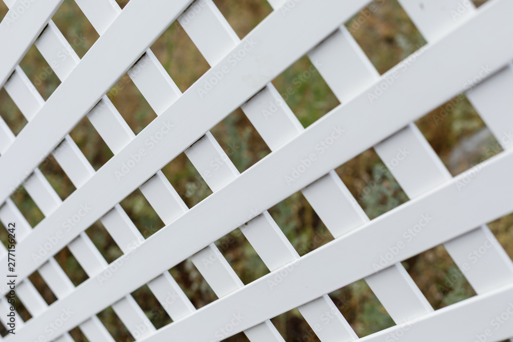 Fototapeta premium White plastic fence for the front garden.