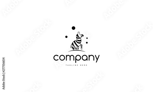 Vector logo which depicts a funny zebra with a raised leg.