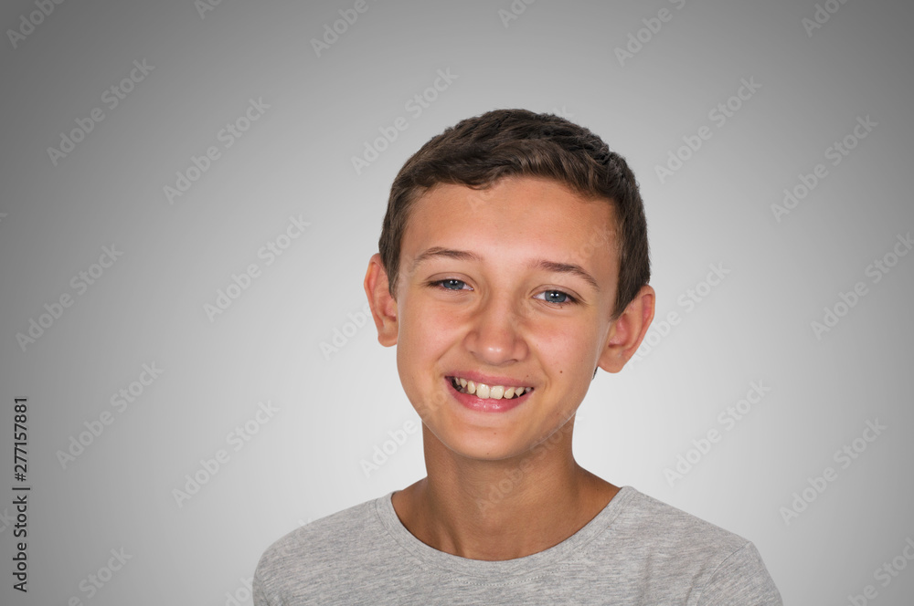 portrait of a smiling happy teen guy portrait of a smiling happy teen guy