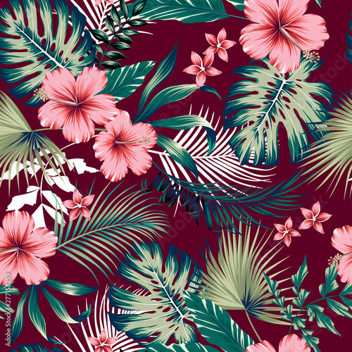 vector seamless botanical tropical pattern with flowers. Lush foliage floral design with monstera leaves, areca palm leaves, fan palm, hibiscus flower, frangipani flower. Modern allover background.