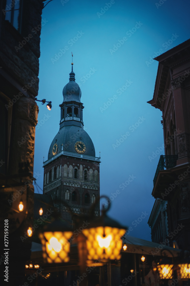 St. Peter's Cathedral in Riga, Latvia at night, beautiful cityscape