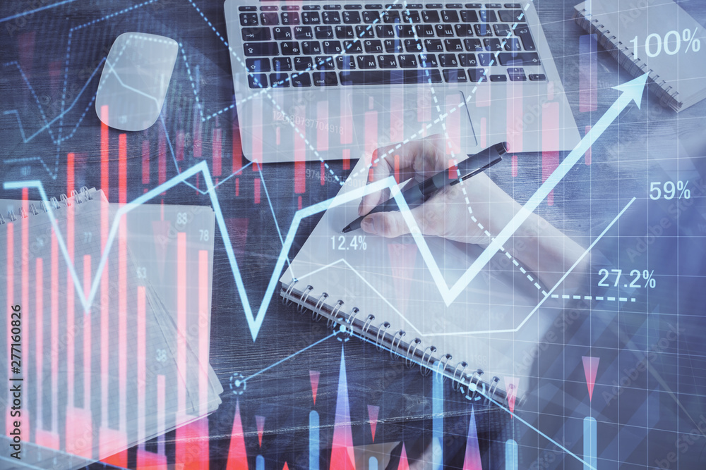 Forex chart displayed on woman's hand taking notes background. Concept of research. Multi exposure Forex chart displayed on woman's hand taking notes background. Concept of research. Multi exposure
