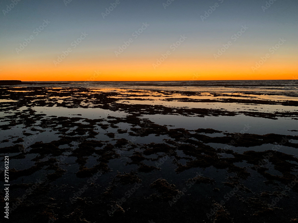 Sonnenuntergange bei Ebbe am Nigalooo Reef