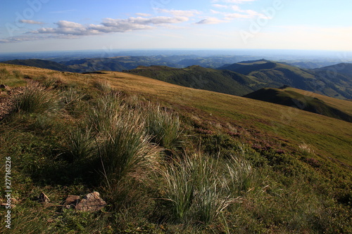 Early summer evening and wide view from Puy Chavaroche  Cantal  Auvergne region  France 