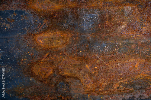 Dark worn rusty metal texture background. Colored iron metal wall texture