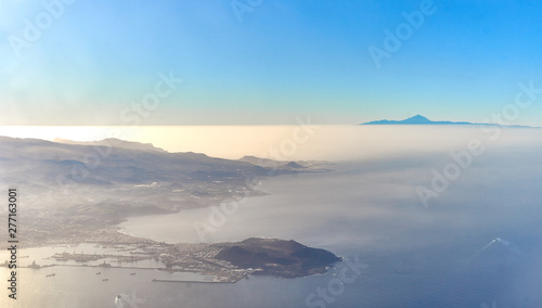 Capital of Gran Canararia from above / Las Palmas with harbor / Volcano "Teide" in the back and peninsula "La Isleta" in the front