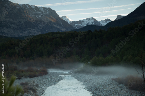 Cinca river between morning mists photo