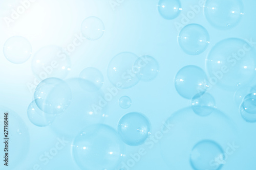 blue soap bubbles background.