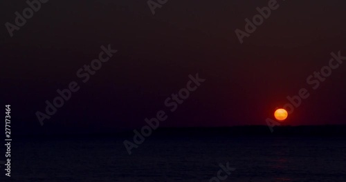 Time lapse of setting sun over the adriatic sea
