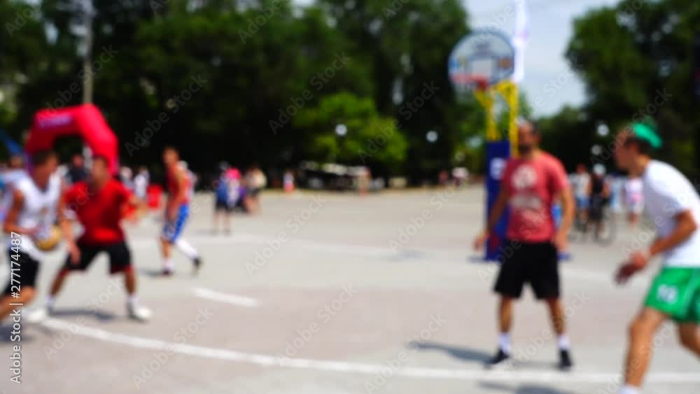 Public competitions in Streetball. Slow motion. Out of focus. Public competitions in Streetball. Slow motion. Out of focus.