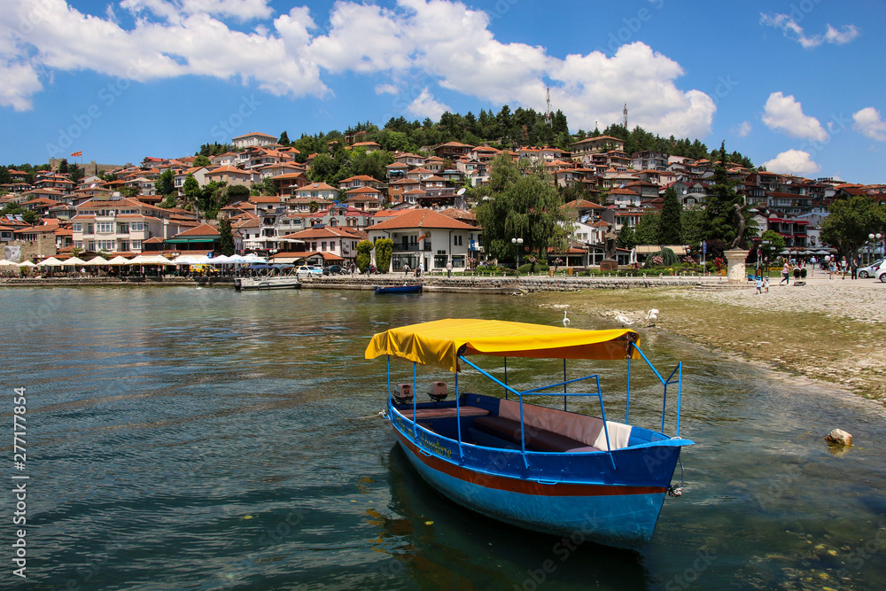 Fishing boat in the background historical part town Ohrid, UNESCO heritage listed, Republic of North Macedonia