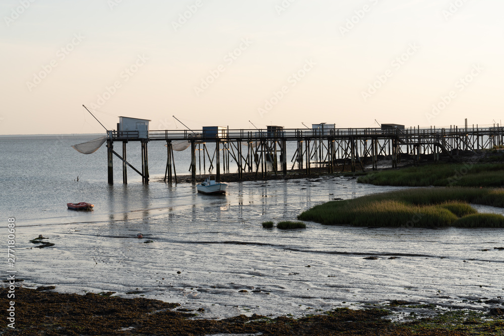 fishing huts on stilts at Fouras at sunset Aquitaine France fishing huts on stilts at Fouras at sunset Aquitaine France