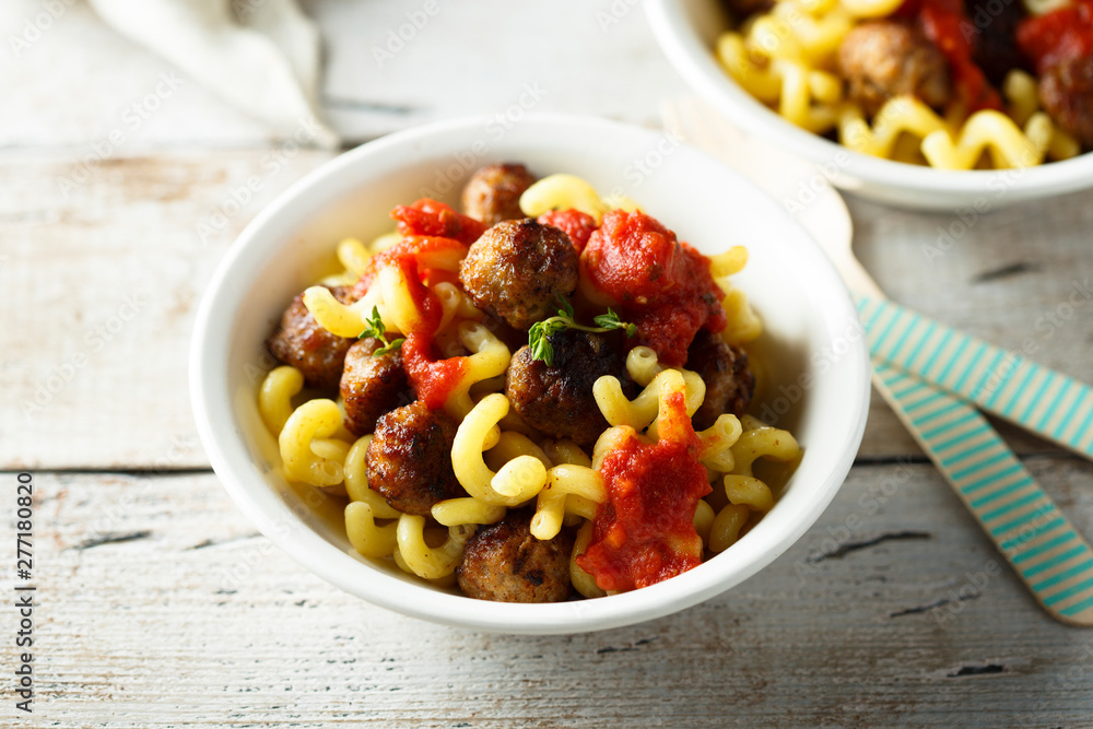 Homemade pasta with meatballs and tomato sauce Homemade pasta with meatballs and tomato sauce