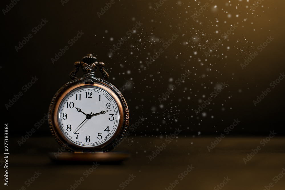 Old pocket watch on dark background Old pocket watch on dark background