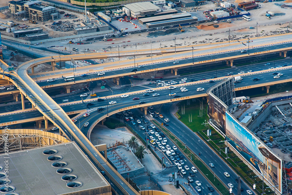 Dubai, United Arab Emirates - July 5, 2019: Roads and streets of Dubai downtown leading to Dubai mall parking