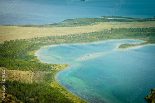 Mountain lake aerial view landscape steppe hills and clouds summer rest tourism