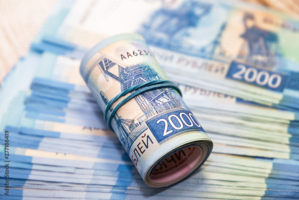 Tax payments. A lot of Russian money. Bills in denominations of two thousand rubles Tax payments. A lot of Russian money. Bills in denominations of two thousand rubles