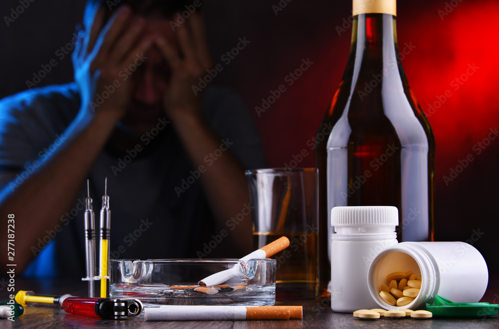 Addictive substances and the figure of a addicted man Addictive substances and the figure of a addicted man