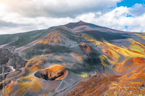 View of the active volcano Etna, extinct craters on the slope, traces of volcanic activity. photo