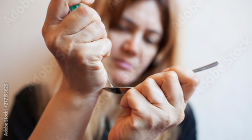 Portrait of a woman preparing drugs