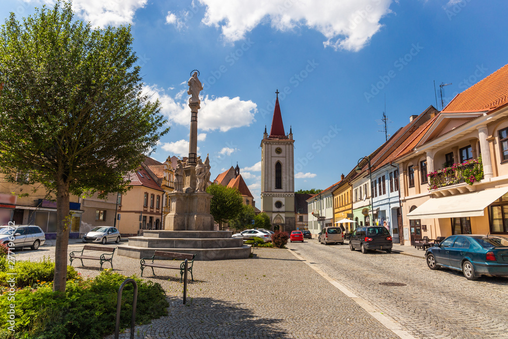 Blatna city. View of a old city square with church. Czech Republic.