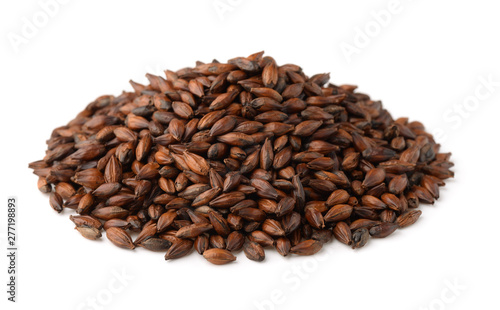 Pile  of dark malted barley seeds photo
