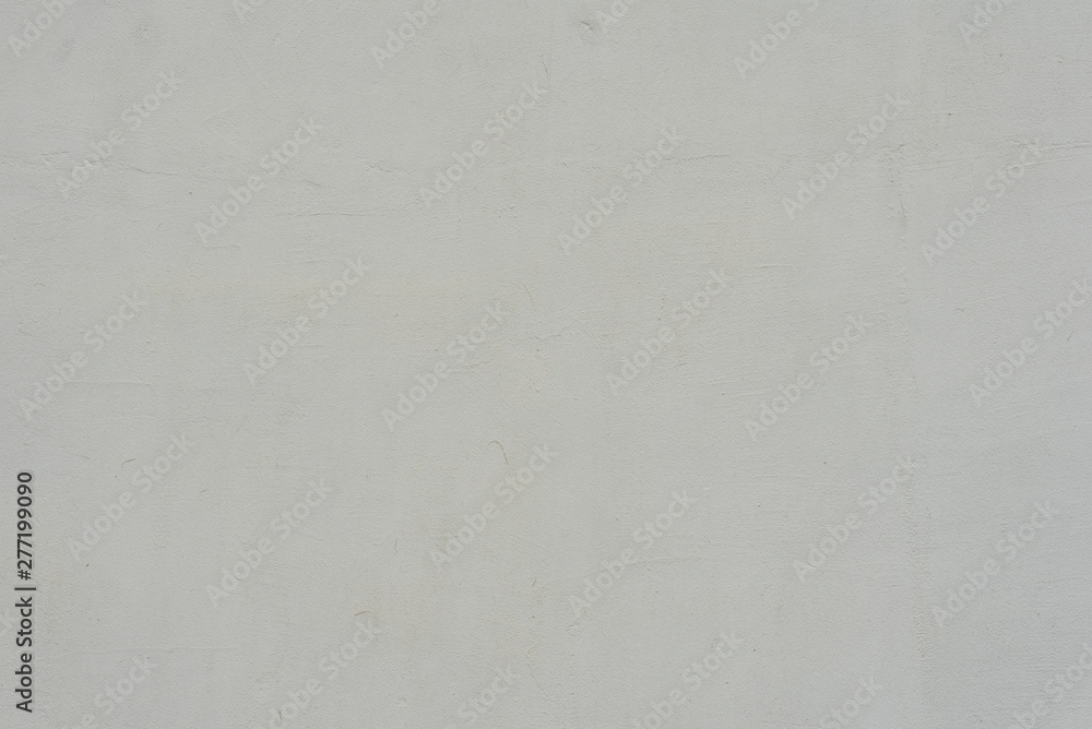 Texture of a concrete wall with cracks and scratches which can be used as a background Texture of a concrete wall with cracks and scratches which can be used as a background