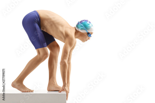 Fotografie, Obraz Young boy swimmer preparing for a swim