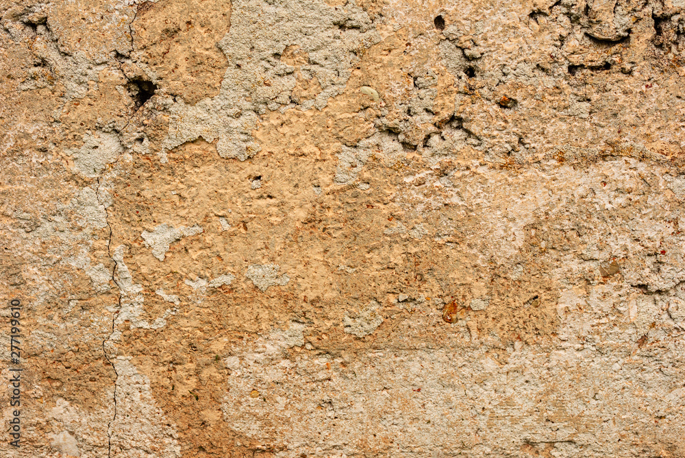 Texture of a concrete wall with cracks and scratches which can be used as a background