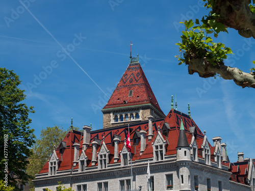 Lausanne, Switzerland - Jun 1st 2019: Château d'Ouchy id refined hotel in 12-century chateau, Lausanne Switzerland