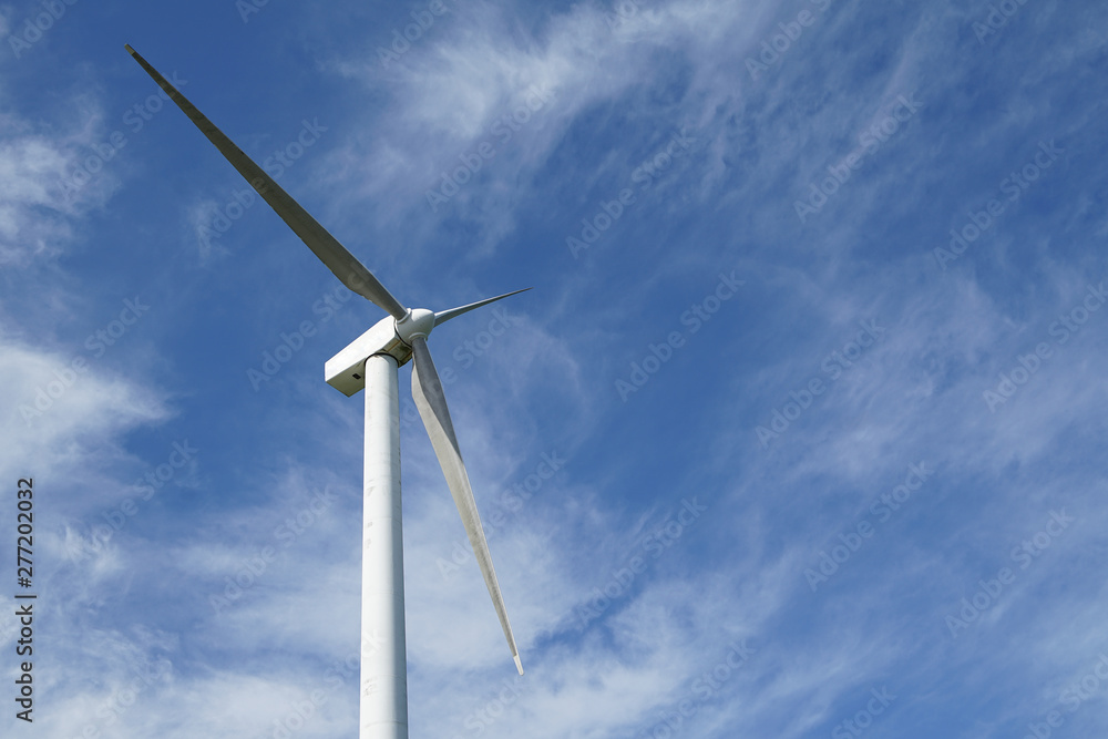 Wind generator blade in sunny blue sky day Wind generator blade in sunny blue sky day