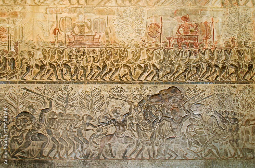 Story of Khmer People Living on the Stone Wall Carving inside of Angkor   Wat at Siem Reap Province, Cambodia.