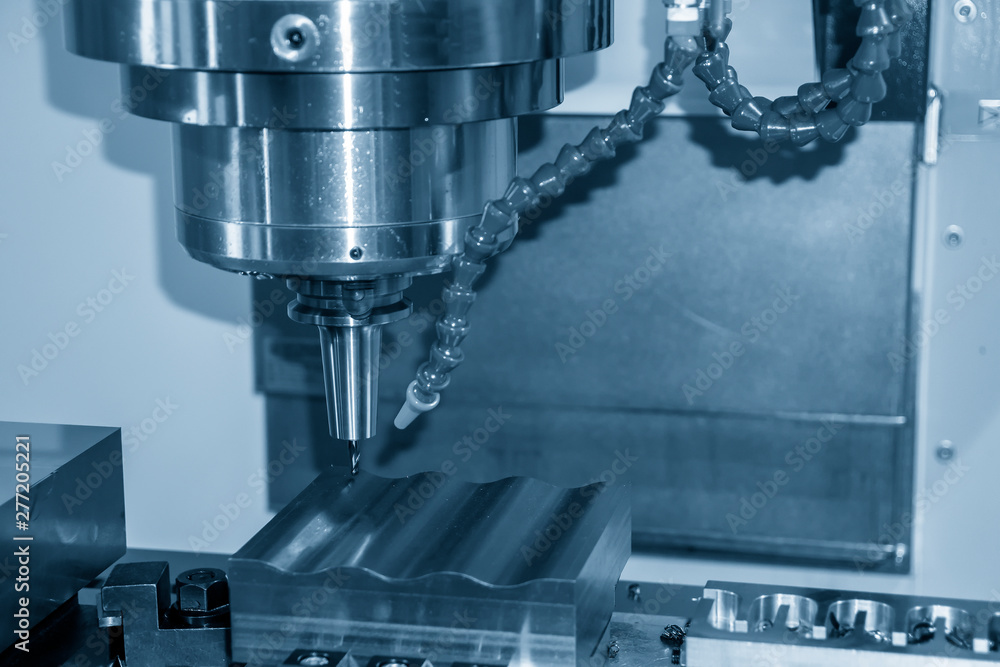 The CNC milling machine cutting the injection mould parts with dolid ball endmill tools. The mould and die manufacturing process by 3-axis machining center. The CNC milling machine cutting the injection mould parts with dolid ball endmill tools. The mould and die manufacturing process by 3-axis machining center.