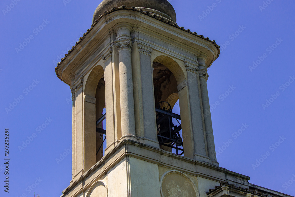 Rome, Italia.07 / 07/2019. The bell tower of a church. The arches that enclose the bells are visible.