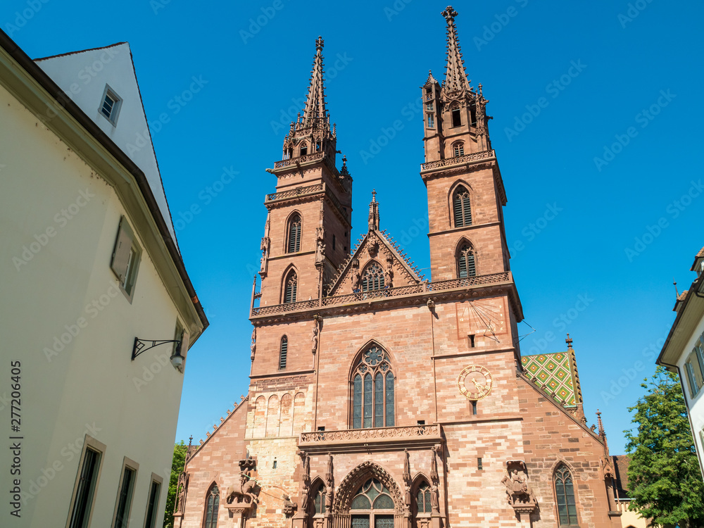 Basel, Switzerland - Jun 2nd 2019:  The Basel Minster, one of the main landmarks and tourist attractions of the Swiss city of Basel.