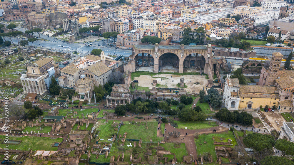 Aerial view of the ancient remains of buildings in the historic city of Rome, Italy. Drone photography