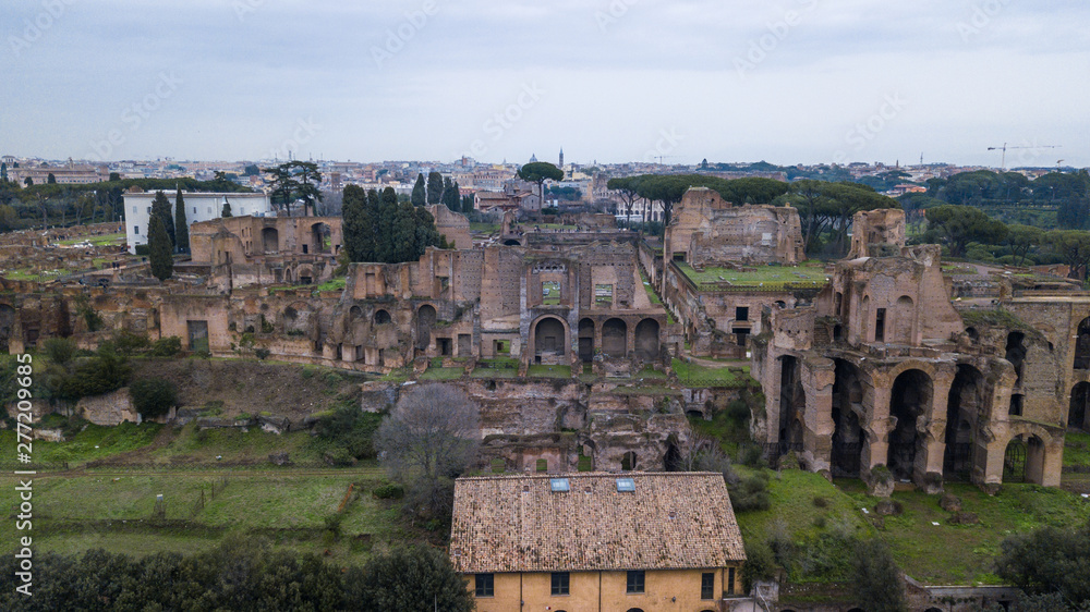 Aerial view of the ancient remains of buildings in the historic city of Rome, Italy. Drone photography