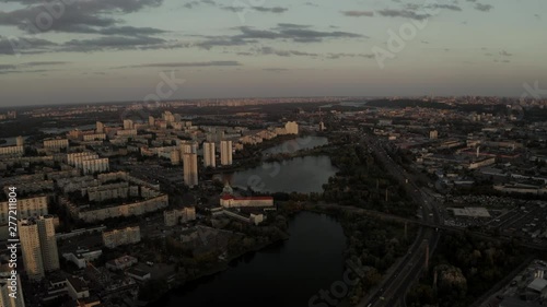 Wallpaper Mural Aerial Shot drone view Flying directly above the city at sunset on lakes and houses Torontodigital.ca
