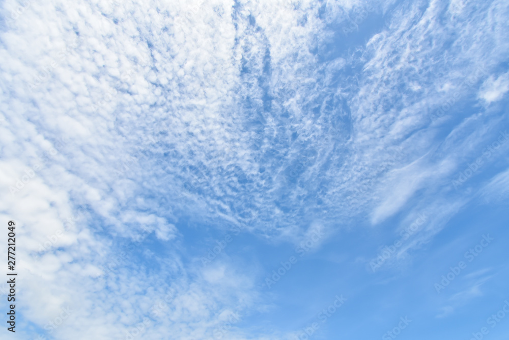 Obraz premium blue sky with white, soft clouds