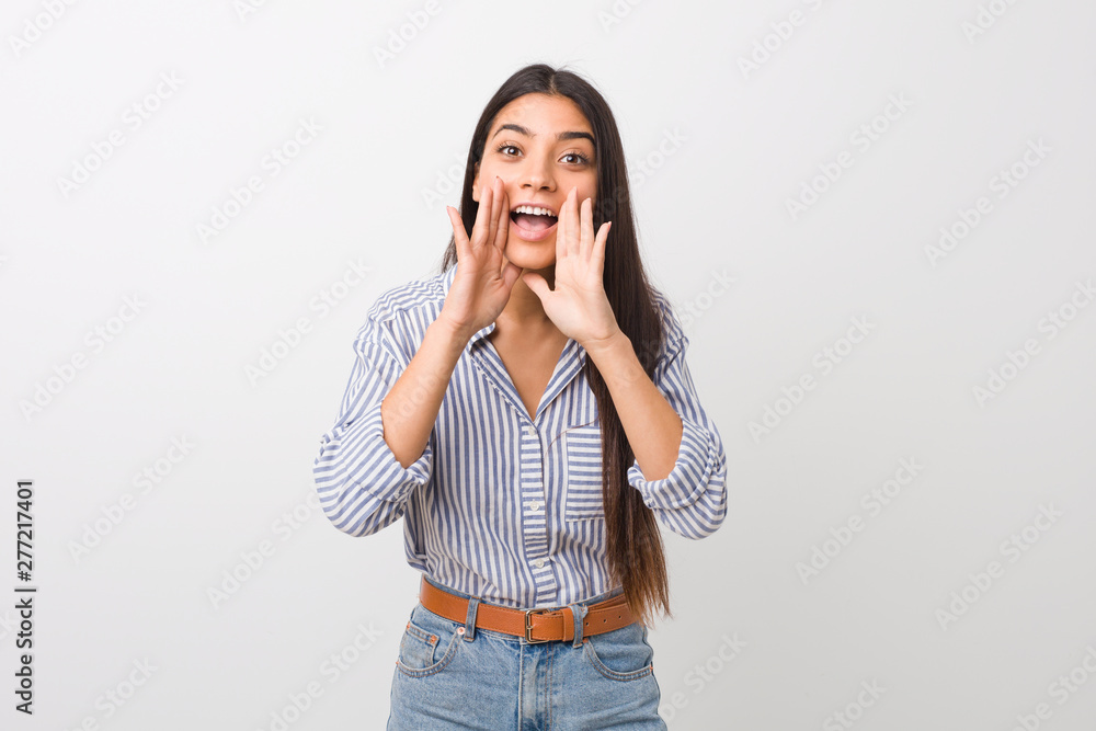 Young pretty arab woman shouting excited to front. Young pretty arab woman shouting excited to front.