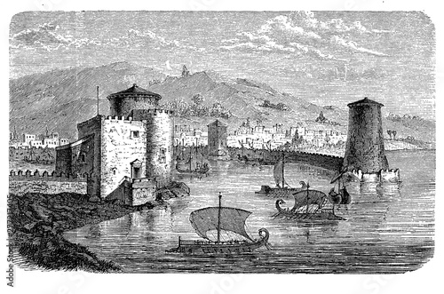 Antiquity: old Mediterranean harbor with fortification and ships