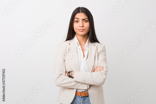Young business arab woman isolated against a white background unhappy looking in camera with sarcastic expression.