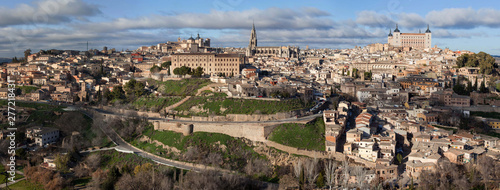 Panoramic view of Toledo, Spain. Alcazar and the ancient city on a hill over the Tagus River, Castilla la Mancha medieval attraction of Espana. High resolution